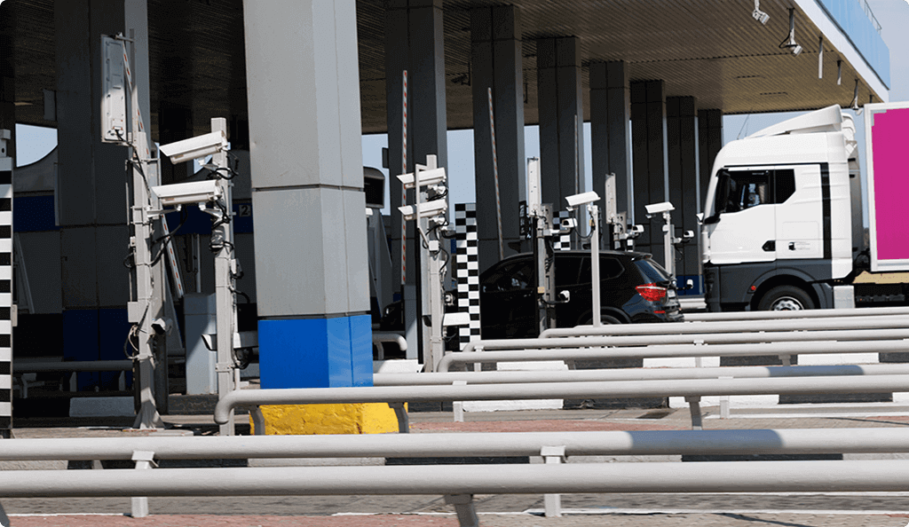 Toll booth or border crossing with numerous surveillance cameras